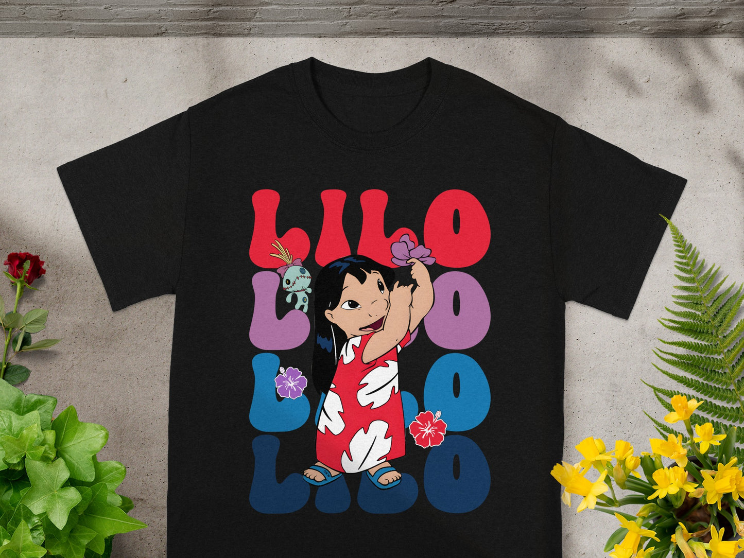 Black t-shirt with Lilo and Stitch characters and the text "LILO & STITCH".