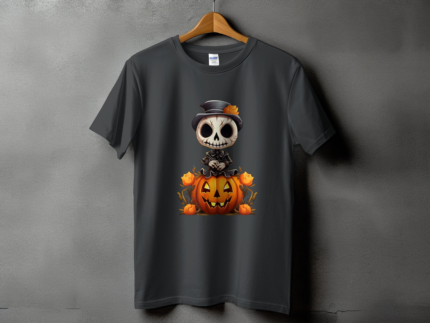 Dark grey t-shirt with cartoon skeleton sitting on a jack-o'-lantern.