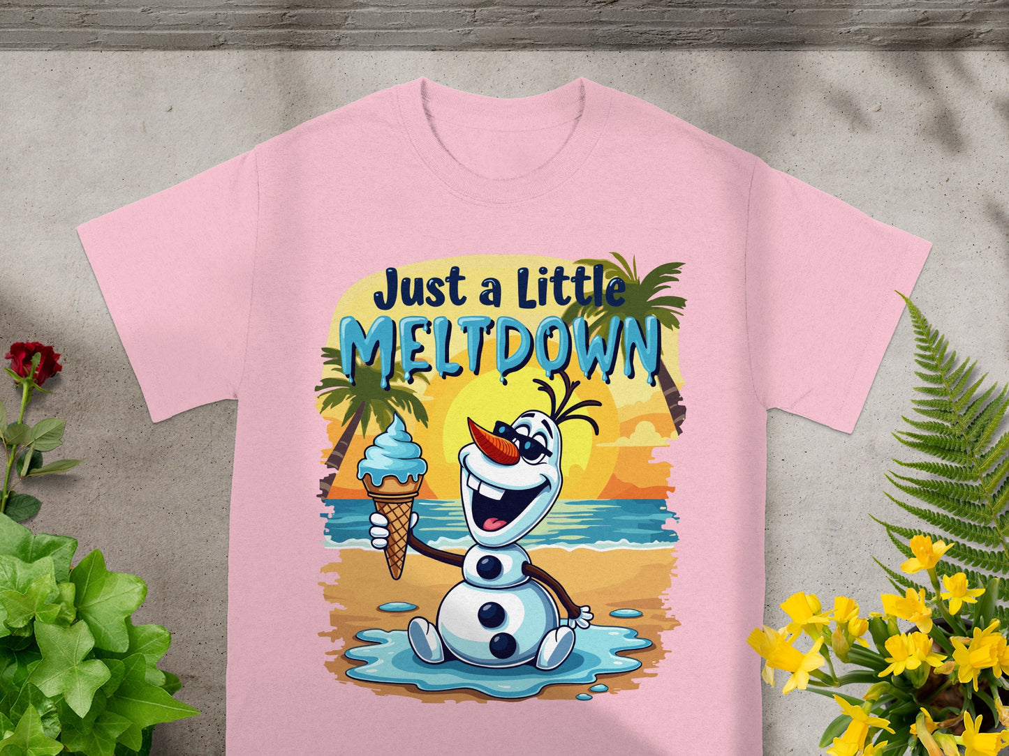 Pink t-shirt with Olaf holding an ice cream cone on a beach.