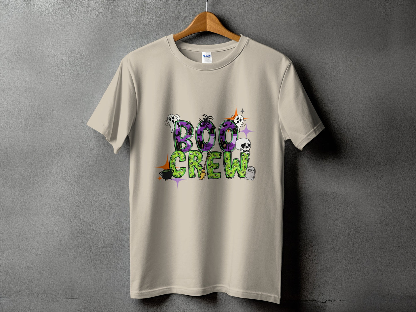 Tan t-shirt with "BOO CREW" text and Halloween graphics.