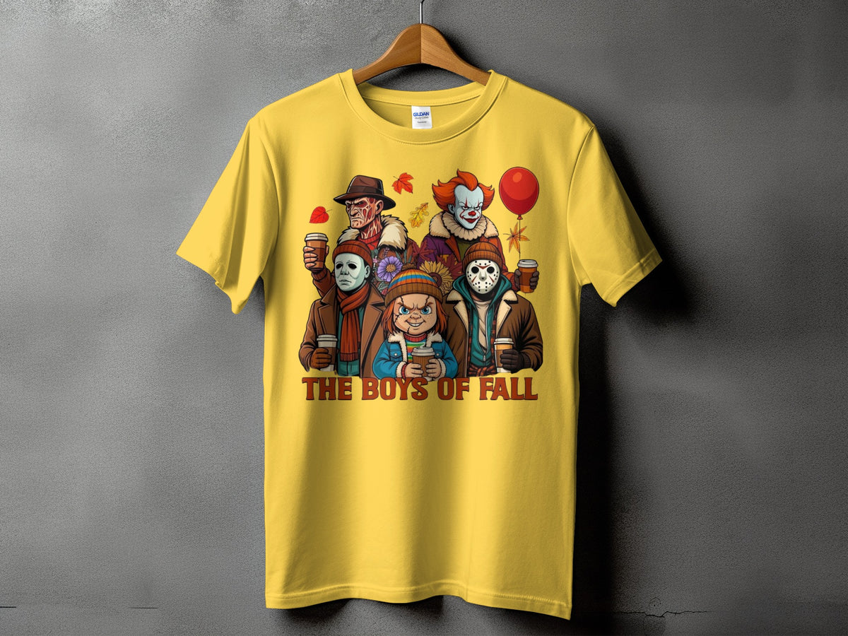 Yellow t-shirt with cartoon horror characters holding coffee cups, text "THE BOYS OF FALL".