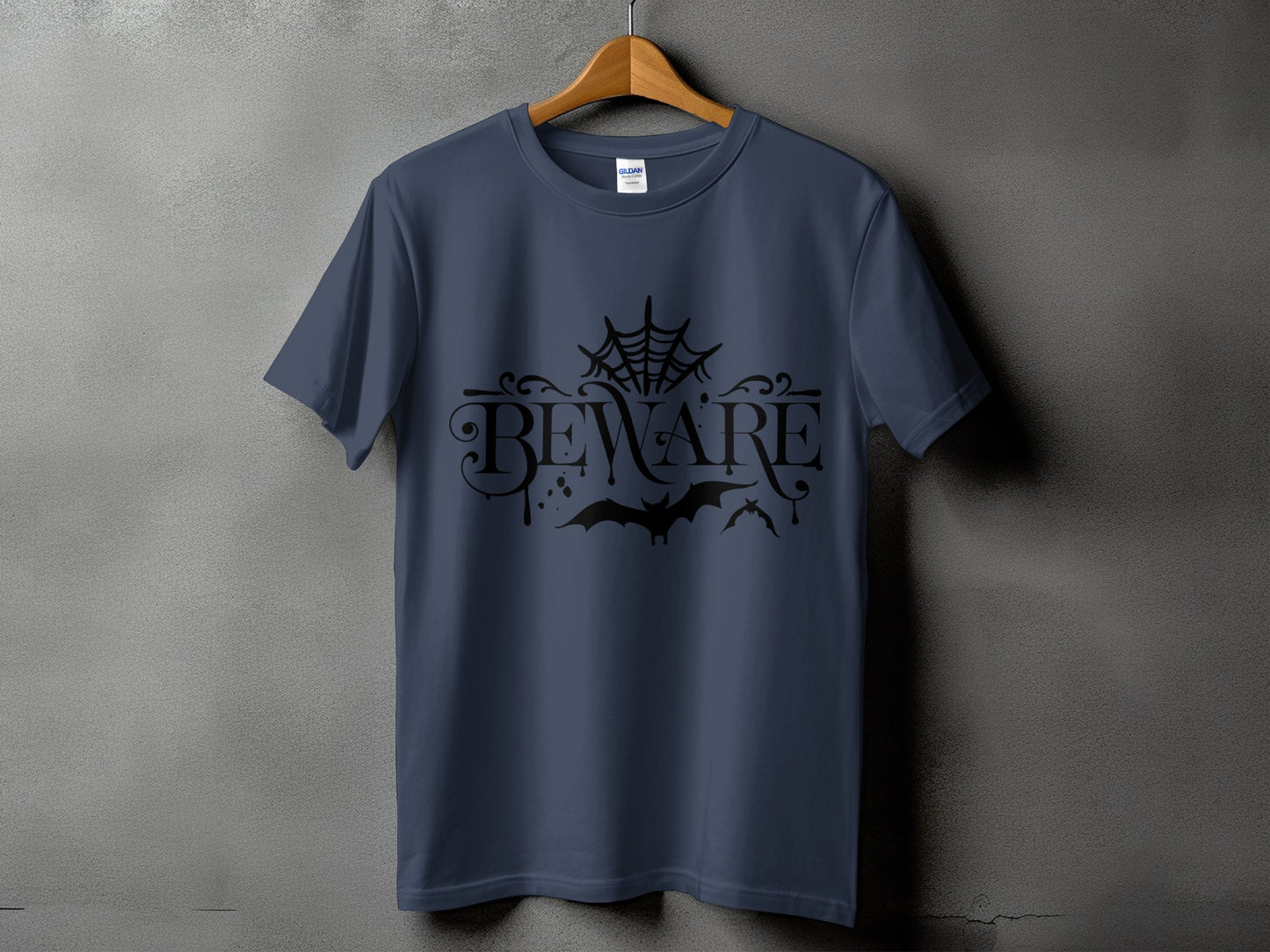 Dark blue t-shirt with black "BEWARE" text, spiderweb, and bats graphic.