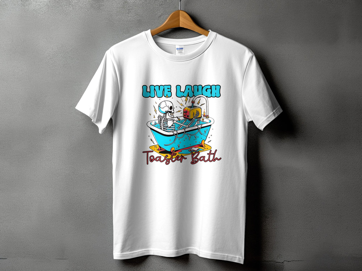 White t-shirt with "Live Laugh Toaster Bath" graphic of a skeleton in a bathtub with a toaster.