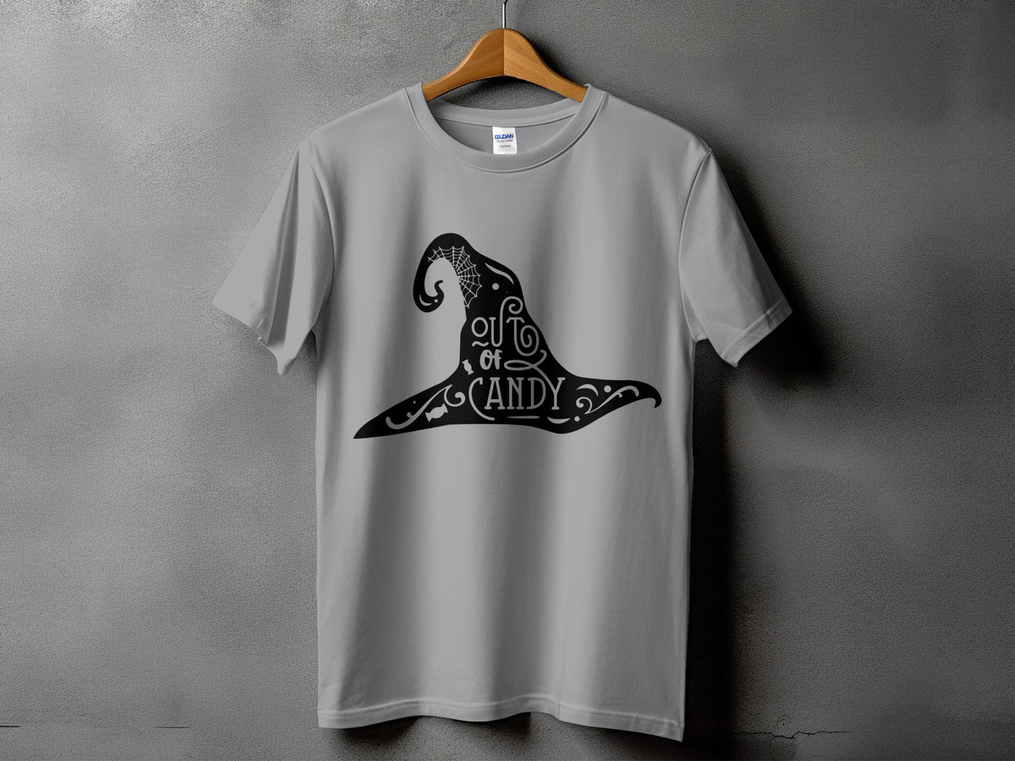 Grey t-shirt with black witch hat graphic that says "Out of Candy".