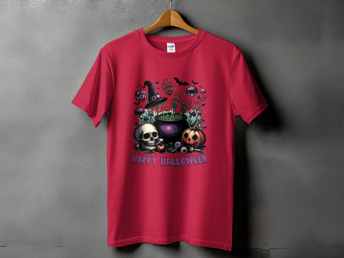 Red t-shirt with Halloween graphic featuring skulls, pumpkin, cauldron, and text "HAPPY HALLOWEEN".