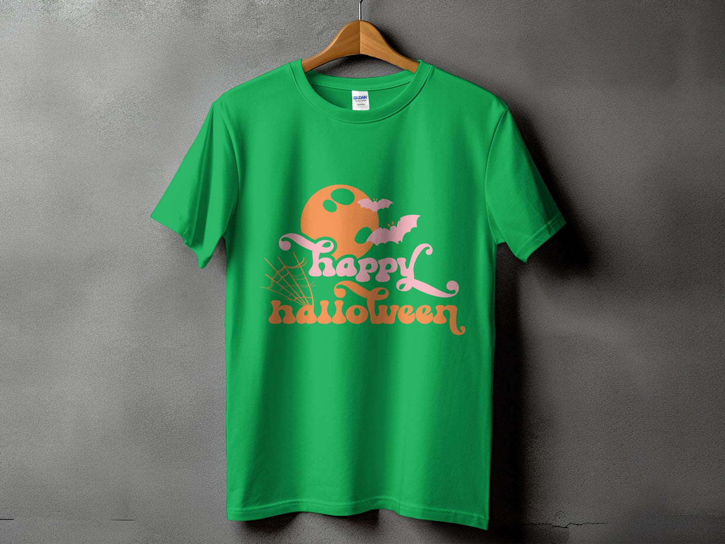 Green t-shirt with "Happy Halloween" text, moon, bats, and spiderweb graphic.