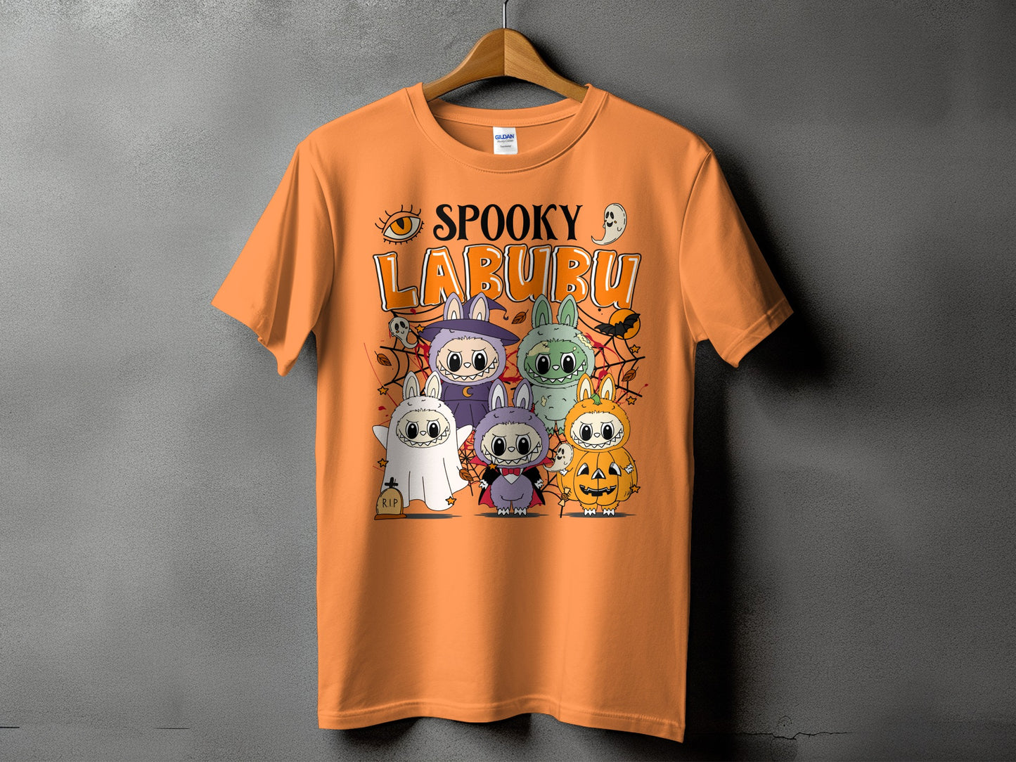 Orange t-shirt with "Spooky Labubu" text and Halloween-themed creatures.