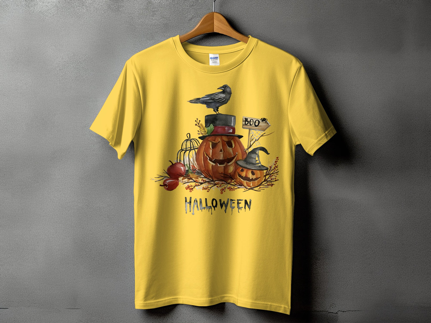 Yellow t-shirt with a Halloween graphic featuring pumpkins, a crow, and the word "Halloween".