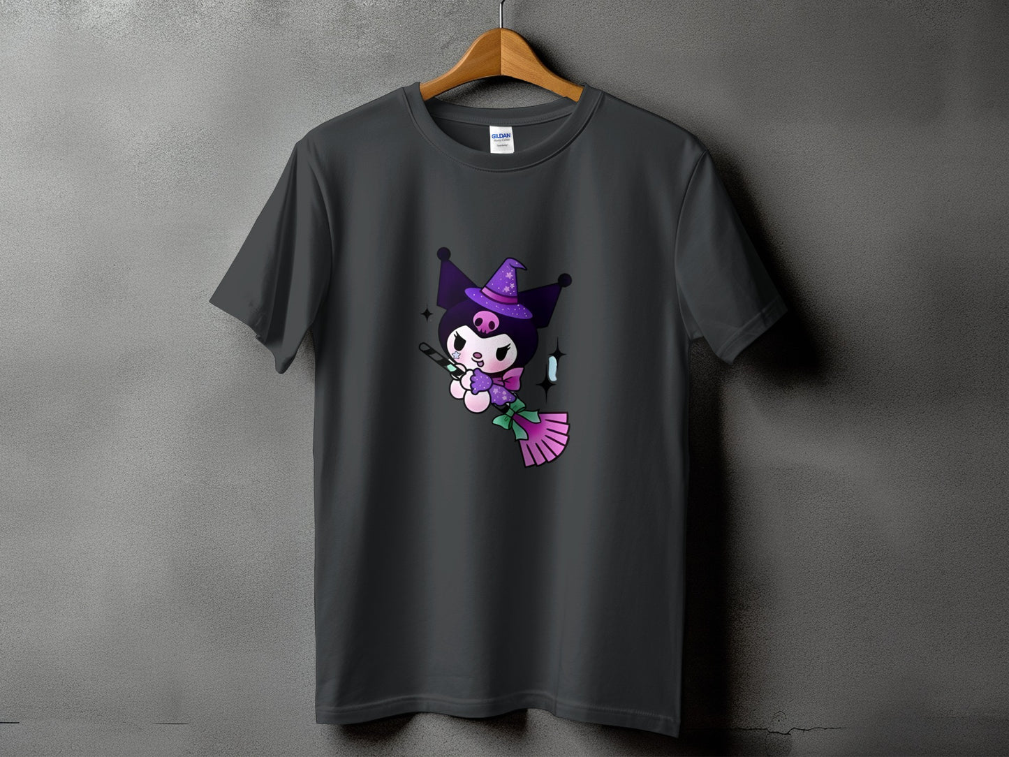 Dark grey t-shirt with Kuromi character wearing a witch hat and riding a broom.