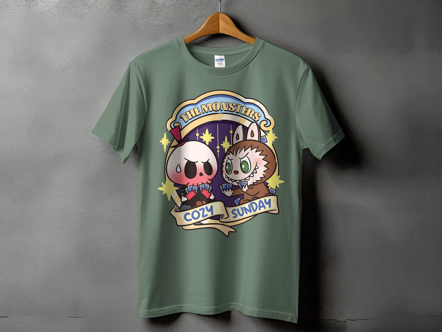 Green t-shirt with "The Monsters Cozy Sunday" graphic featuring cartoon characters.