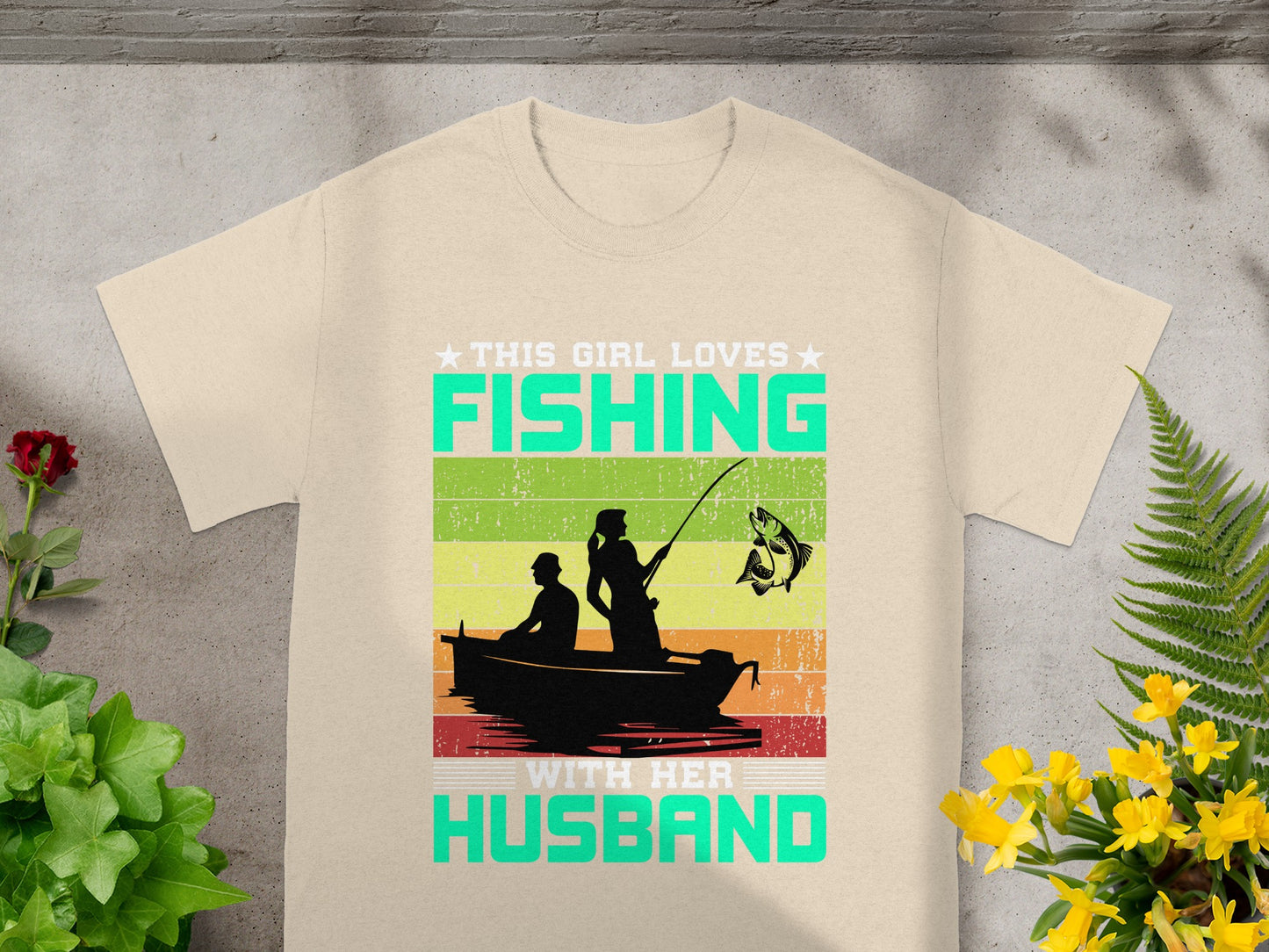This girl loves fishing with her husband graphic tee.