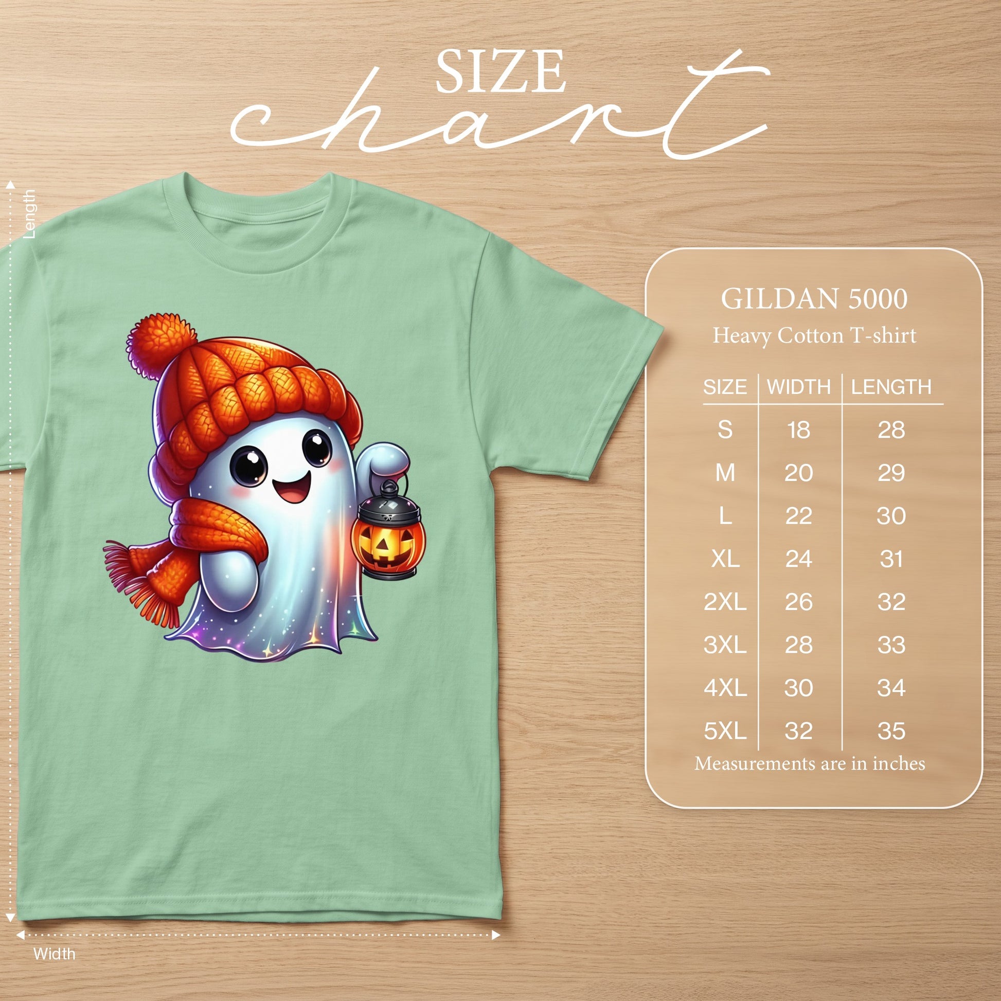 Light green t-shirt with a cute ghost holding a jack-o'-lantern, size chart.