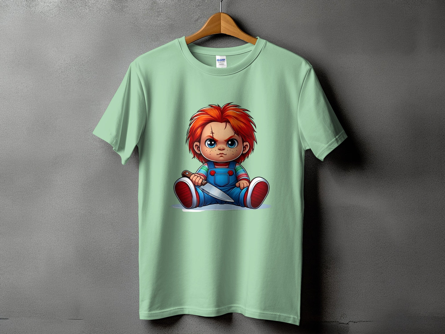 Green t-shirt with Chucky doll holding a knife graphic.