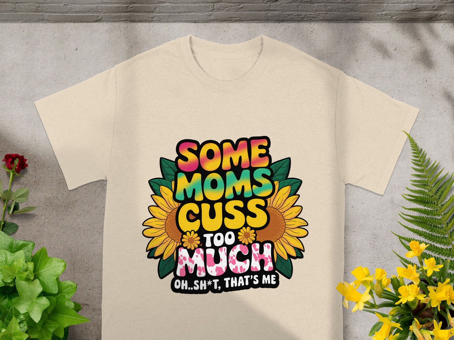 Light beige t-shirt with "Some Moms Cuss Too Much Oh..Sh*t, That's Me" graphic.