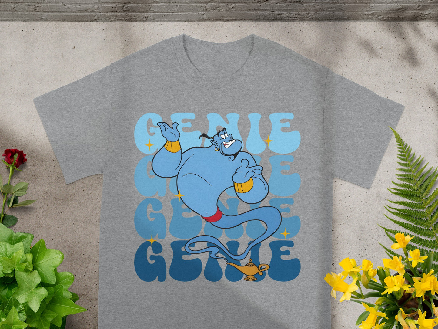 Grey t-shirt with blue genie text and illustration.