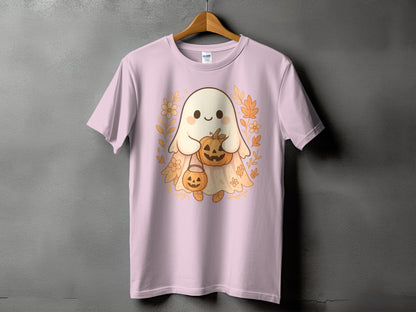 Pink t-shirt with a cute ghost holding pumpkins, surrounded by floral and leaf elements.