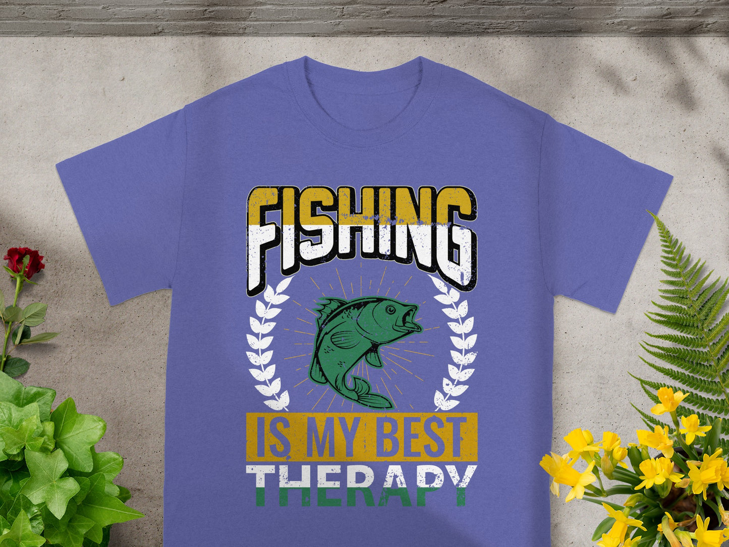 Purple t-shirt with "FISHING IS MY BEST THERAPY" text and a fish graphic.