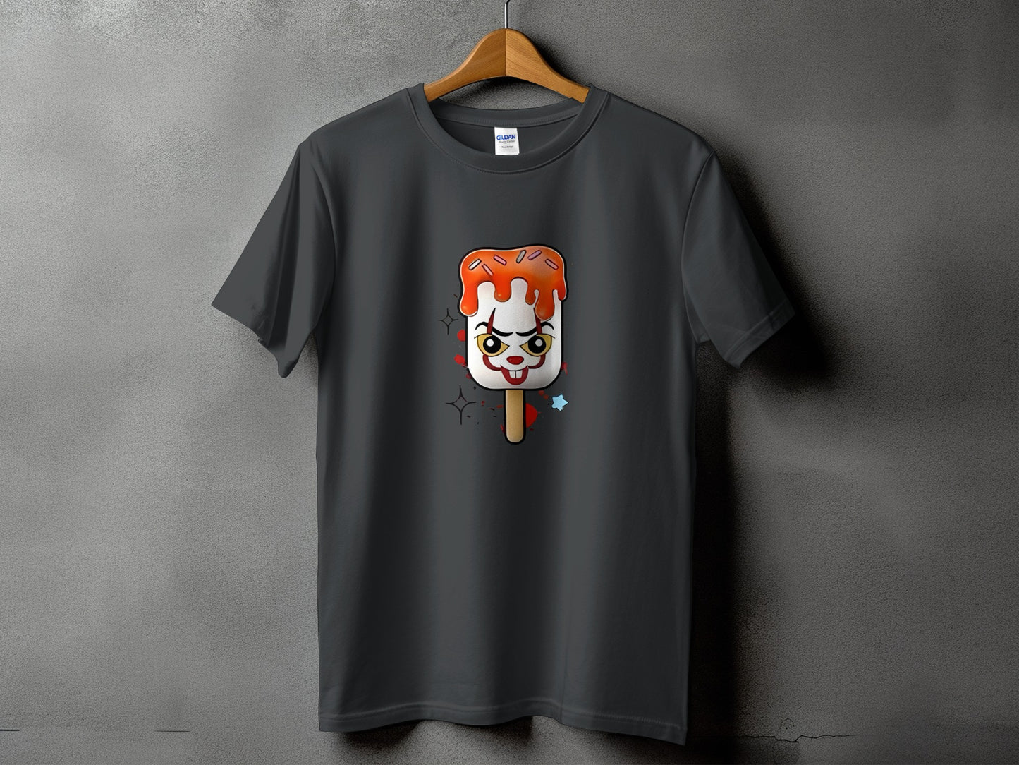 Dark grey t-shirt with a creepy clown popsicle graphic and red drips.