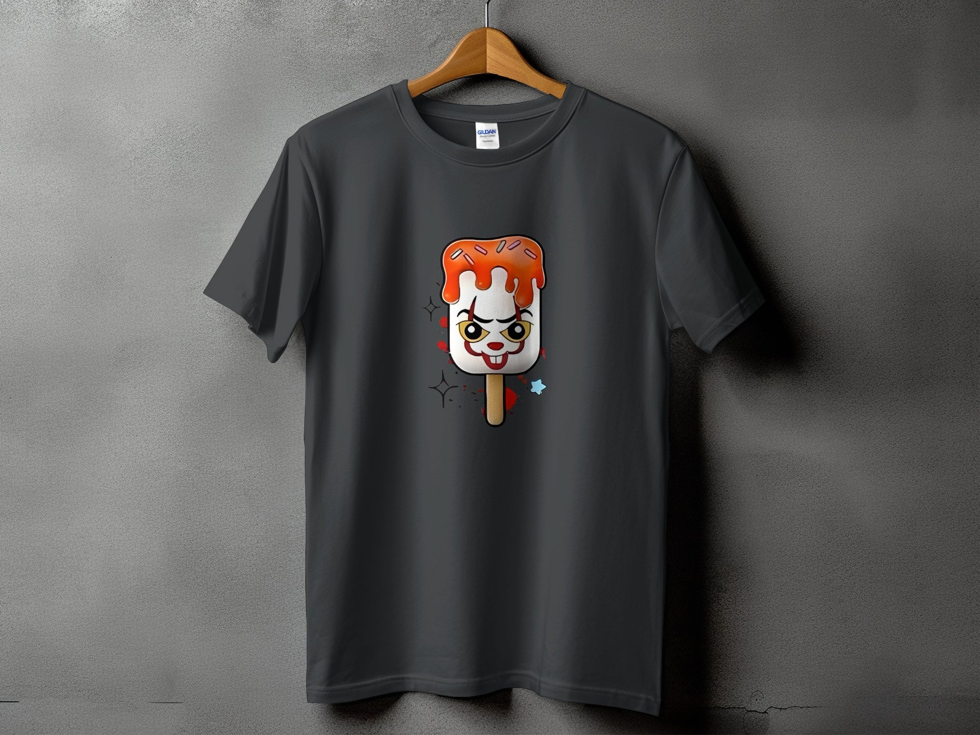 Dark grey t-shirt with a creepy clown popsicle graphic and red drips.