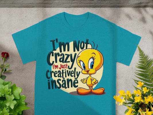 Teal t-shirt with cartoon Tweety Bird saying "I'm Not Crazy, I'm Just Creatively Insane".
