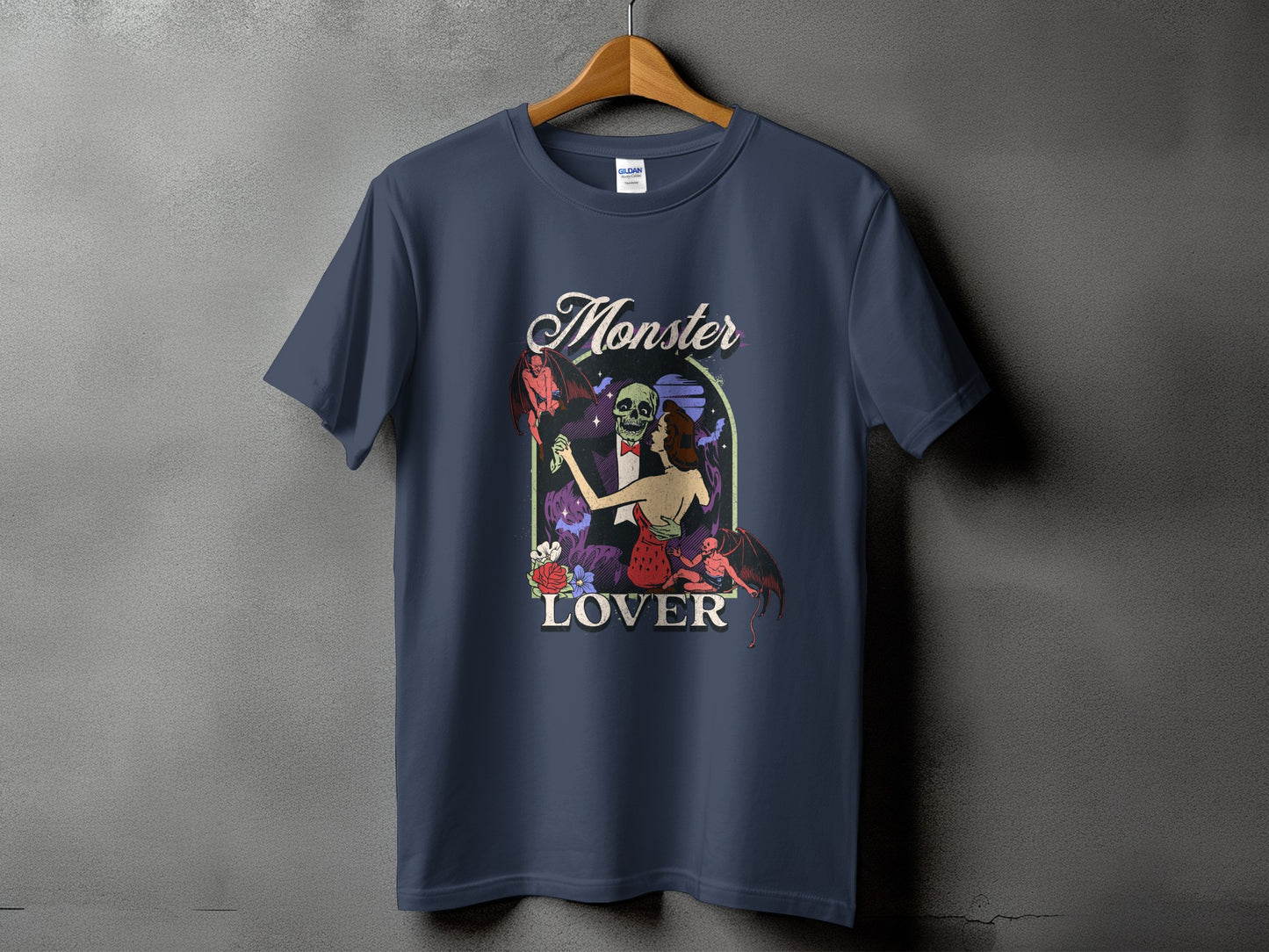 Dark blue t-shirt with "Monster Lover" text and a vintage-style illustration.