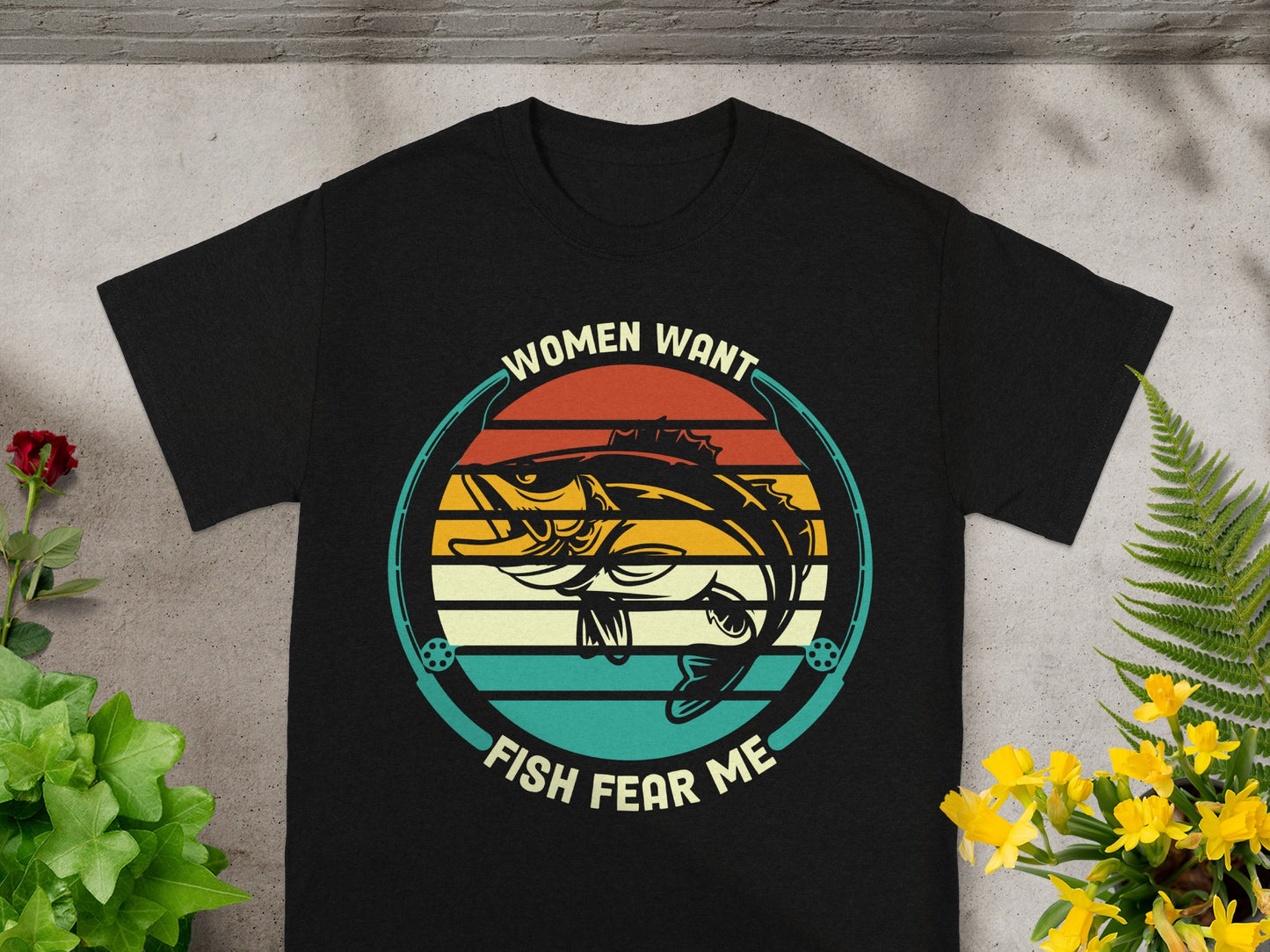 Black t-shirt with graphic of fish and text "WOMEN WANT FISH FEAR ME".
