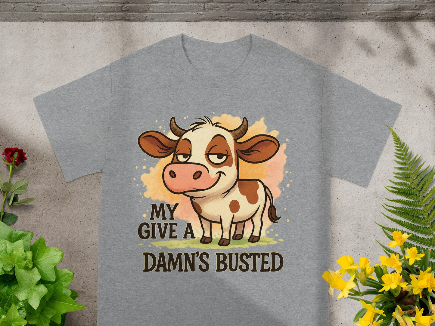 Gray t-shirt with a cartoon cow and text "MY DARN'S BUSTED".