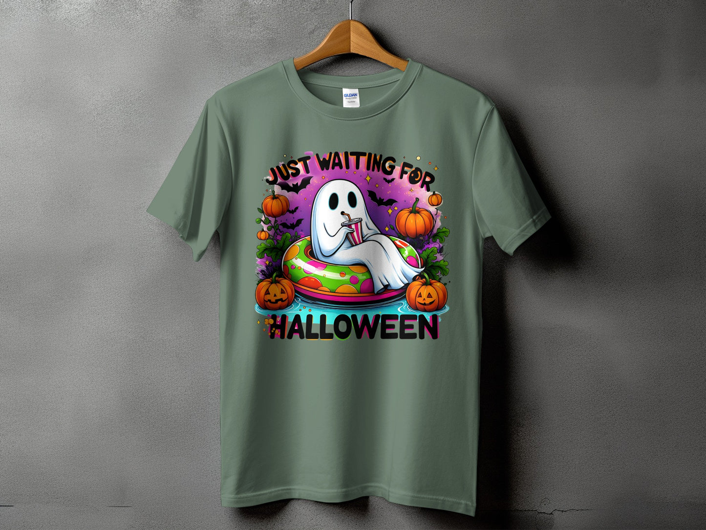 Ghost in floaty with pumpkins, text "JUST WAITING FOR HALLOWEEN."