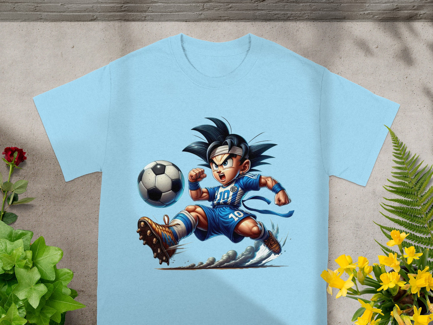 Light blue t-shirt with Dragon Ball Z character Goku playing soccer.