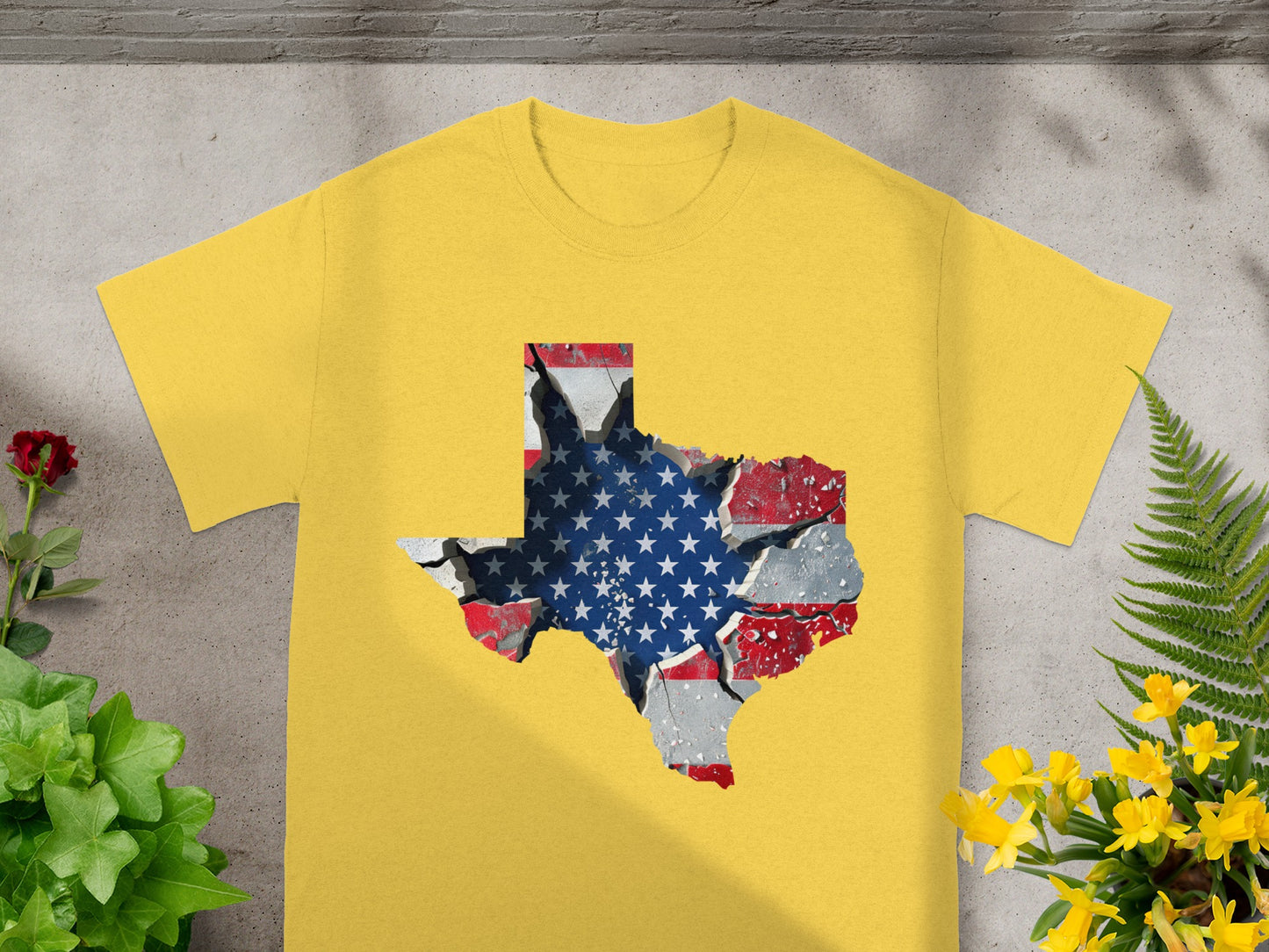 Yellow t-shirt with a fractured Texas map design featuring the American flag.