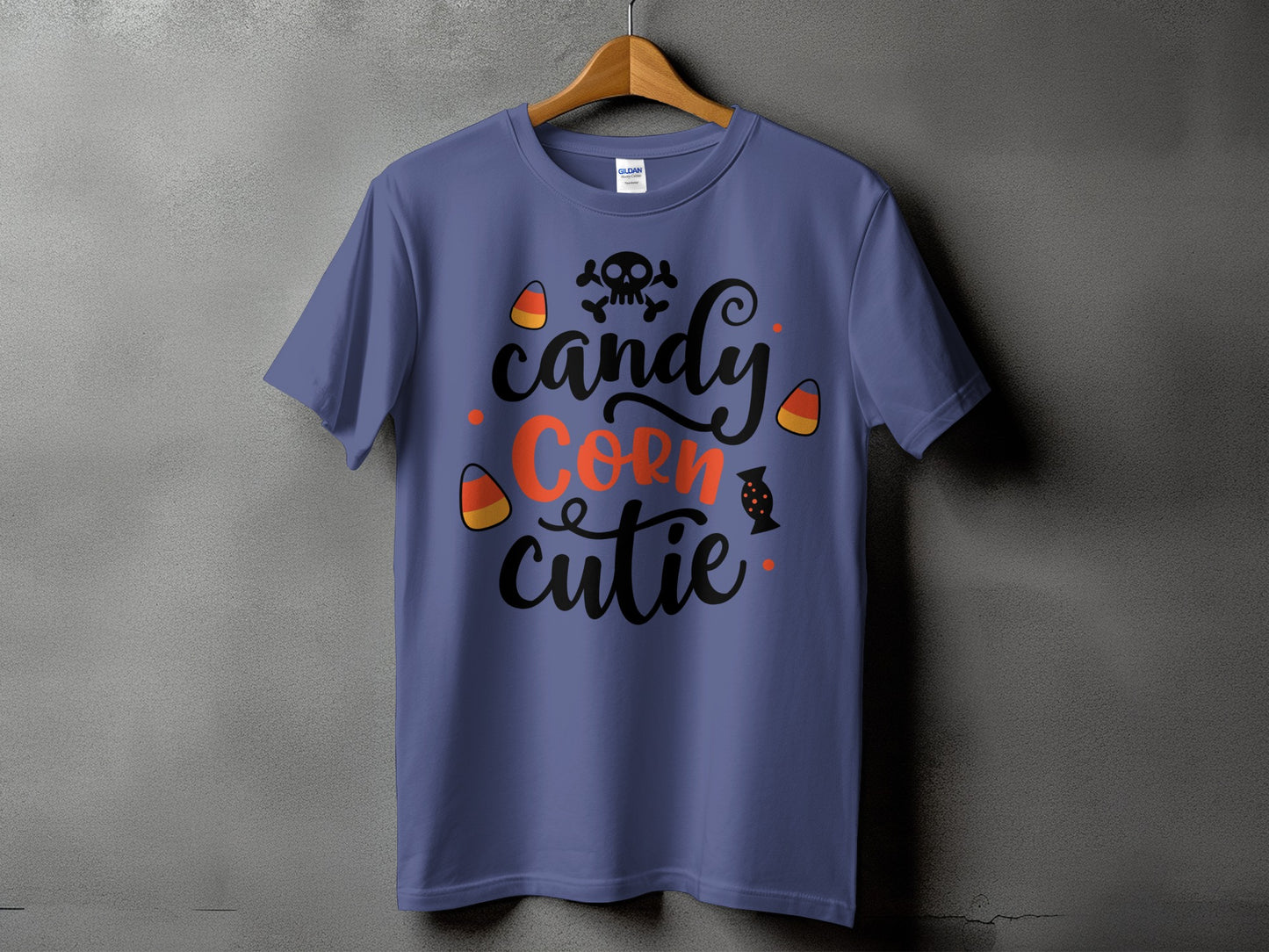 Purple t-shirt with "candy corn cutie" text and Halloween graphics.