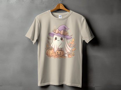 T-shirt with a cute ghost wearing a witch hat surrounded by pumpkins and autumn leaves.