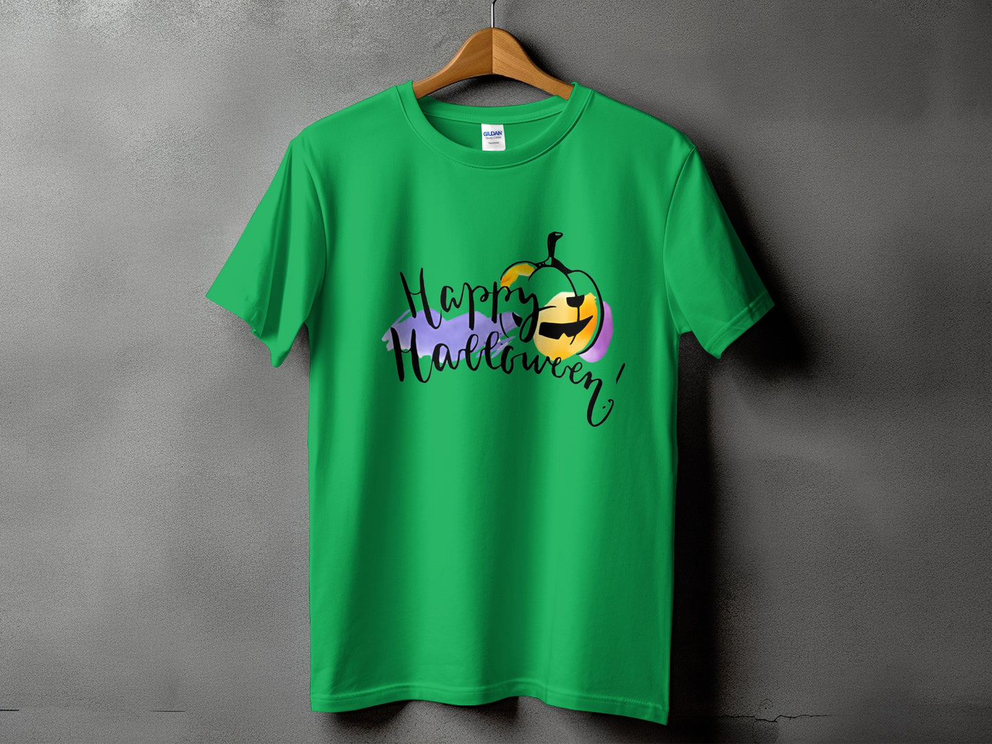 Green t-shirt with a "Happy Halloween" graphic featuring a stylized pumpkin.