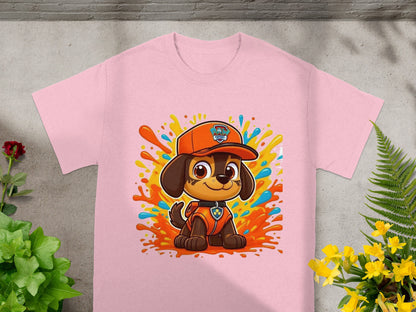 Paw Patrol character Chase on pink t-shirt with colorful splashes.