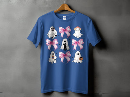 Blue t-shirt with a grid of ghosts, pink bows, and Halloween motifs.