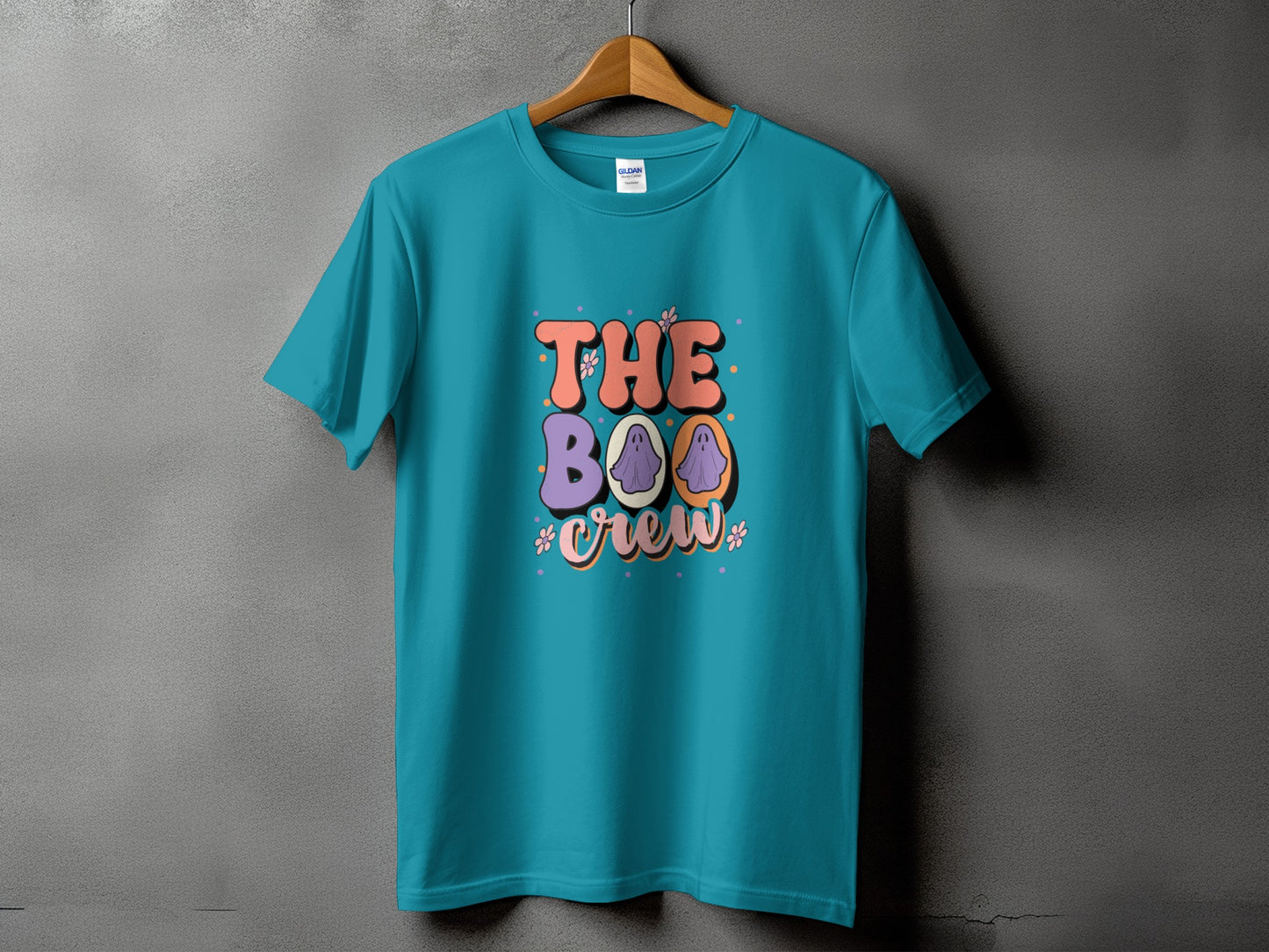 Teal t-shirt with "The Boo Crew" text and cartoon ghosts.