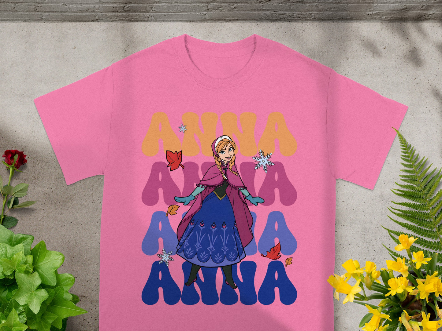 Pink t-shirt with Anna from Frozen, "Anna" text.