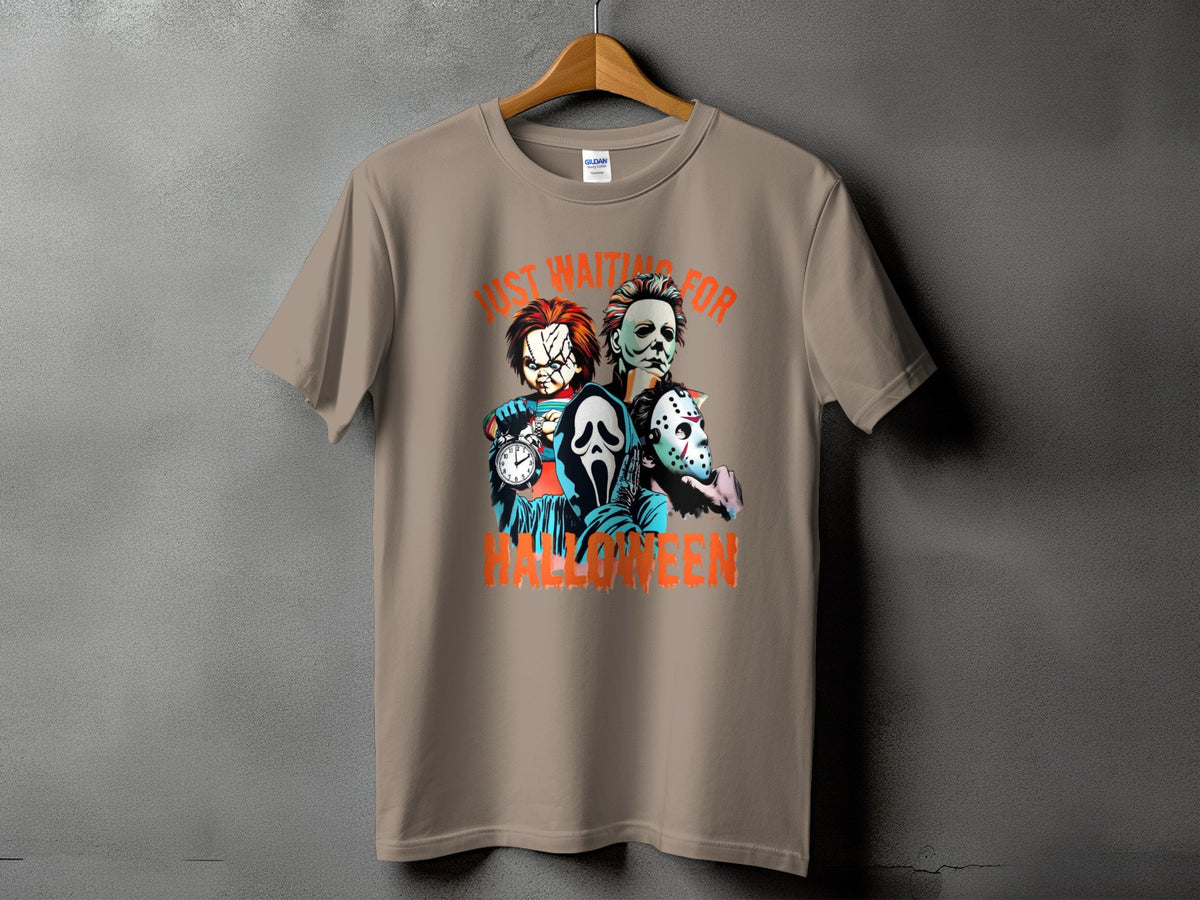 T-shirt with Chucky, Michael Myers, Ghostface, and Jason Voorhees characters and "Just Waiting For Halloween" text.