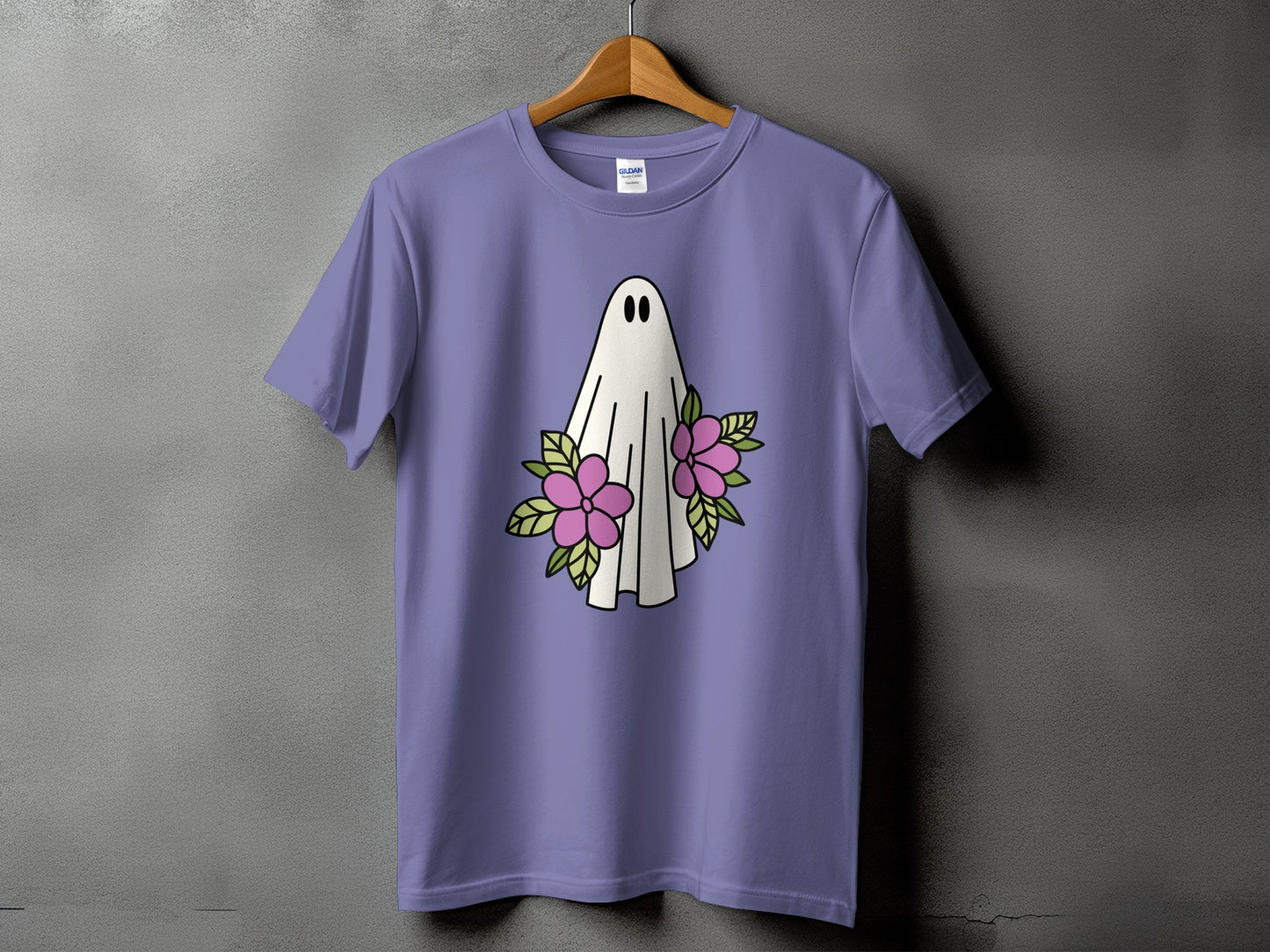 Lavender t-shirt with a white ghost illustration surrounded by pink flowers.
