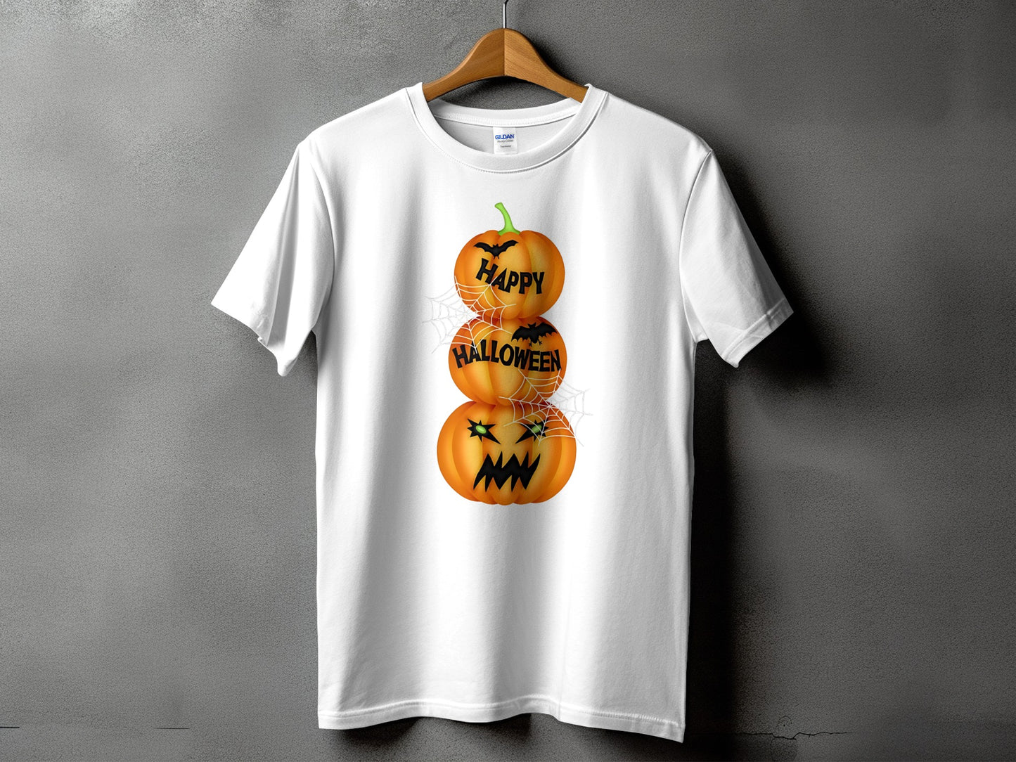 White t-shirt with stacked Halloween pumpkins that say "Happy Halloween".