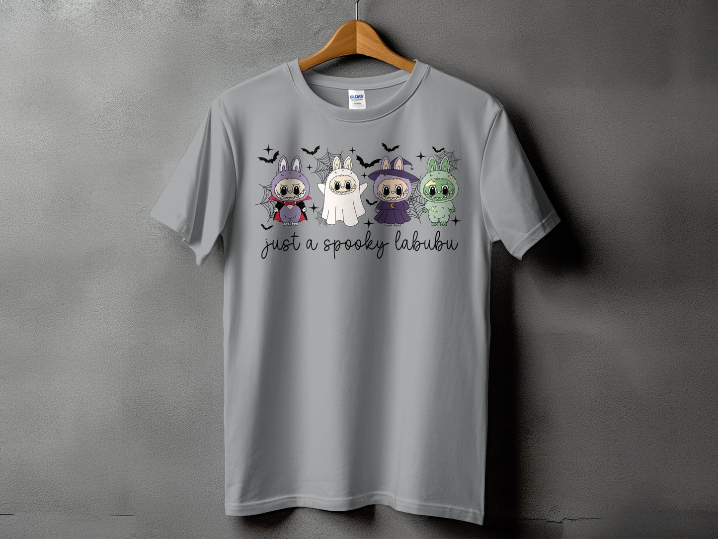 Gray t-shirt with four Halloween-themed Labubu characters and text "just a spooky labubu".