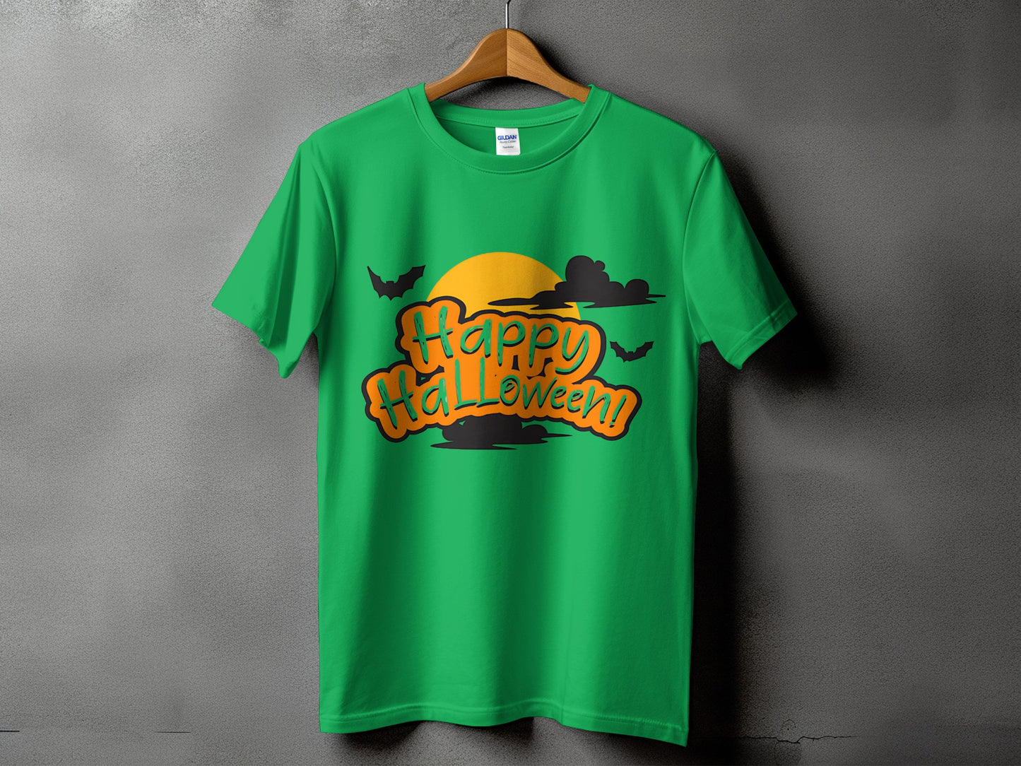 Green t-shirt with "Happy Halloween!" text, moon, clouds, and bats graphic.