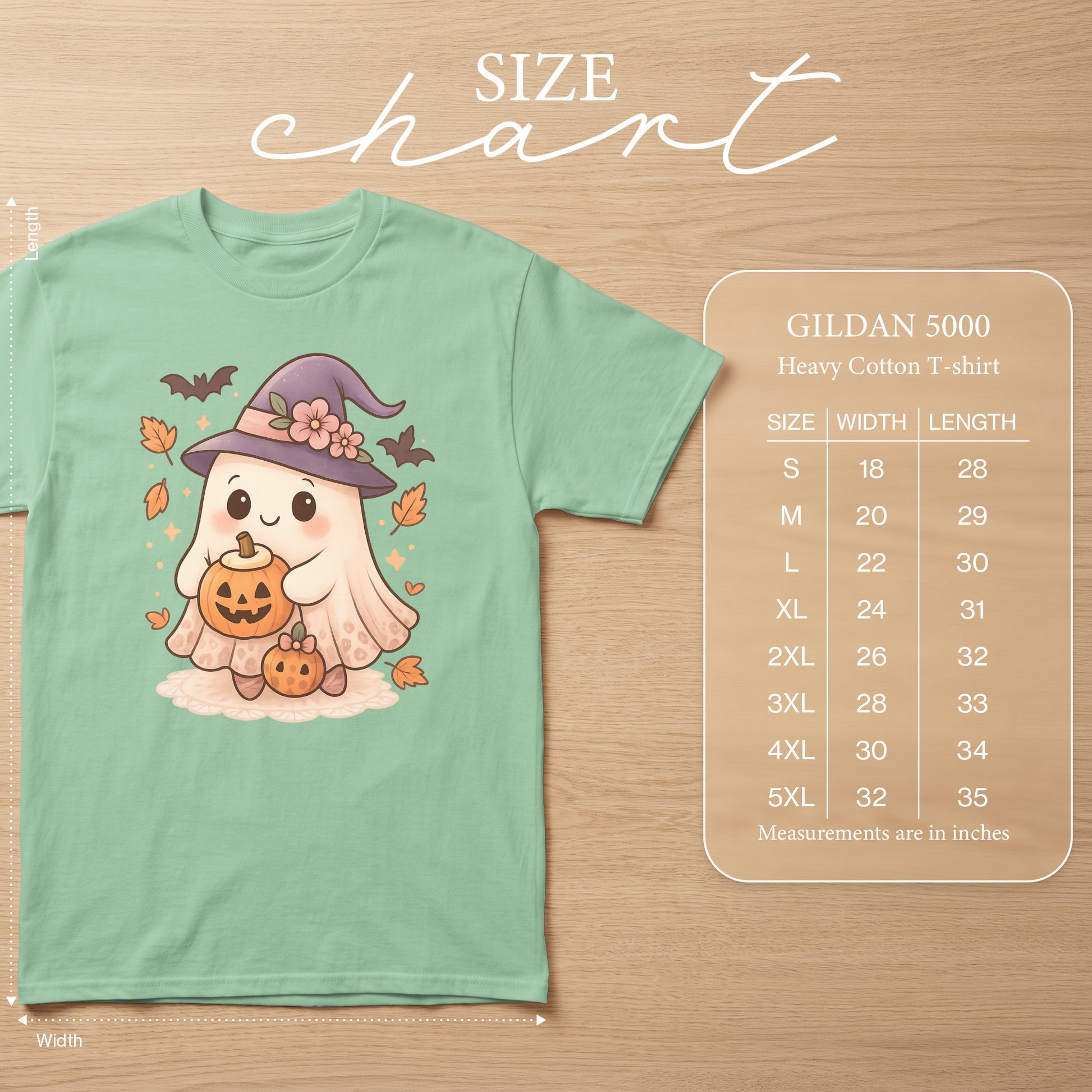 Light green Gildan 5000 t-shirt with a cute ghost holding pumpkins, bats, and leaves.