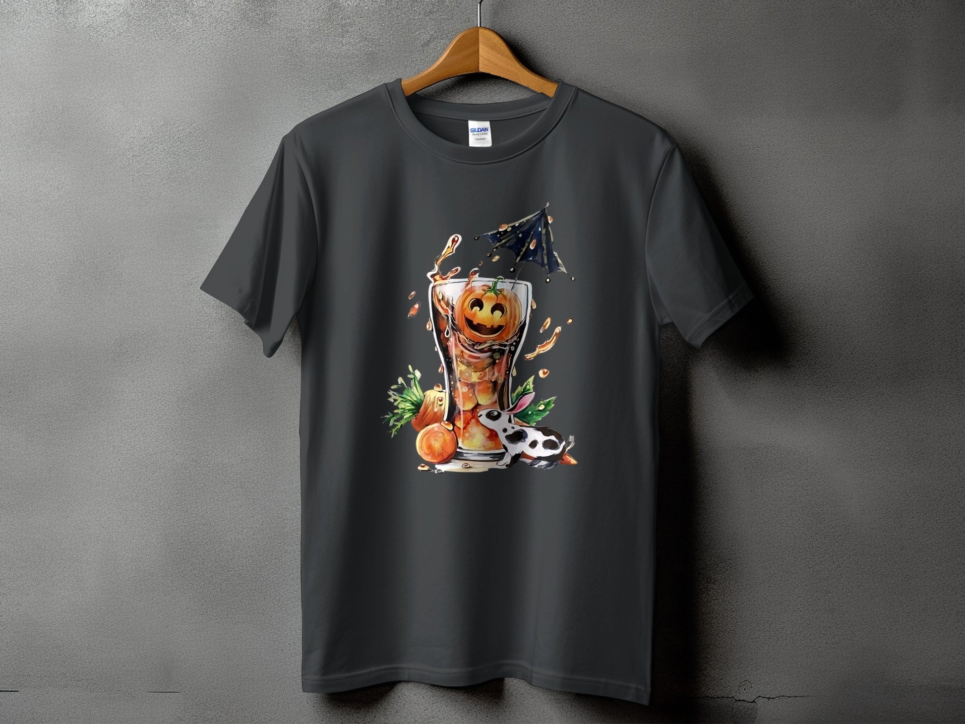 Dark t-shirt with a Halloween cocktail featuring a pumpkin face and a black and white bunny.