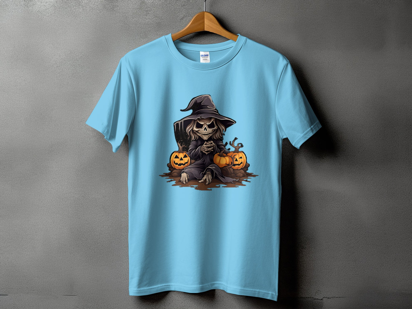 Light blue t-shirt with a grim reaper graphic and pumpkins.