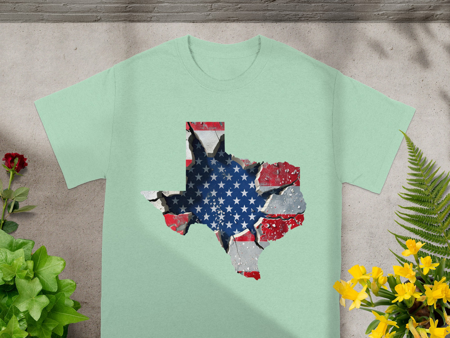 Light green t-shirt with a distressed Texas map overlaid with the American flag.