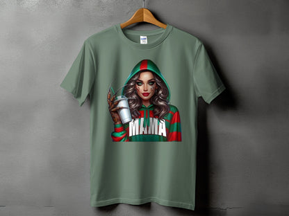 Green t-shirt with a graphic of a woman in a hooded sweater with red and green stripes and the word "MAMA".