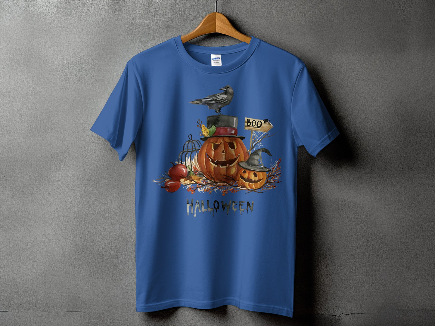 Blue t-shirt with Halloween graphic featuring pumpkins, a crow, and the word "HALLOWEEN".