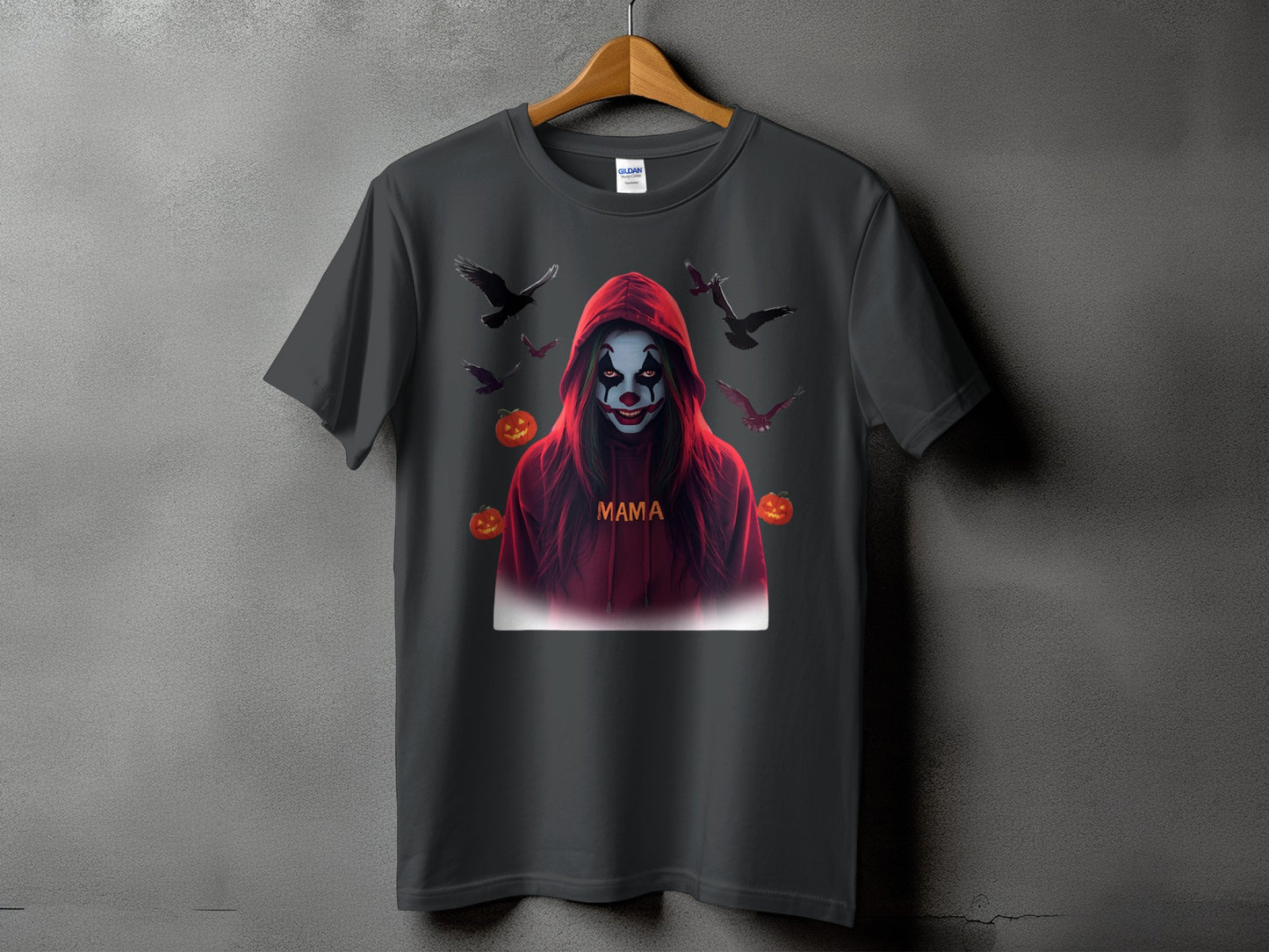 Dark t-shirt with a hooded clown graphic, crows, and pumpkins.