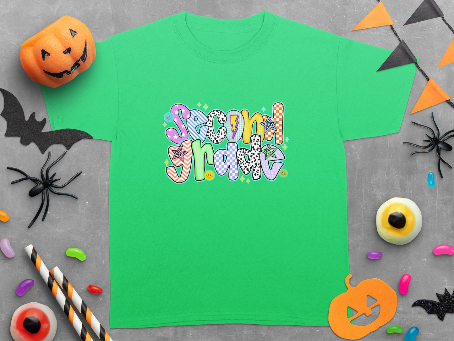 Green t-shirt with "Second Grade" in colorful, patterned, groovy text.